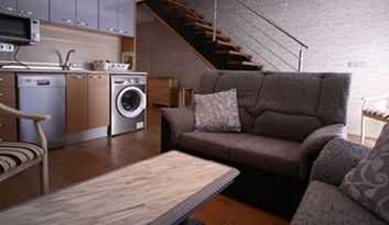 Apartamentos Turísticos La Rocanda image